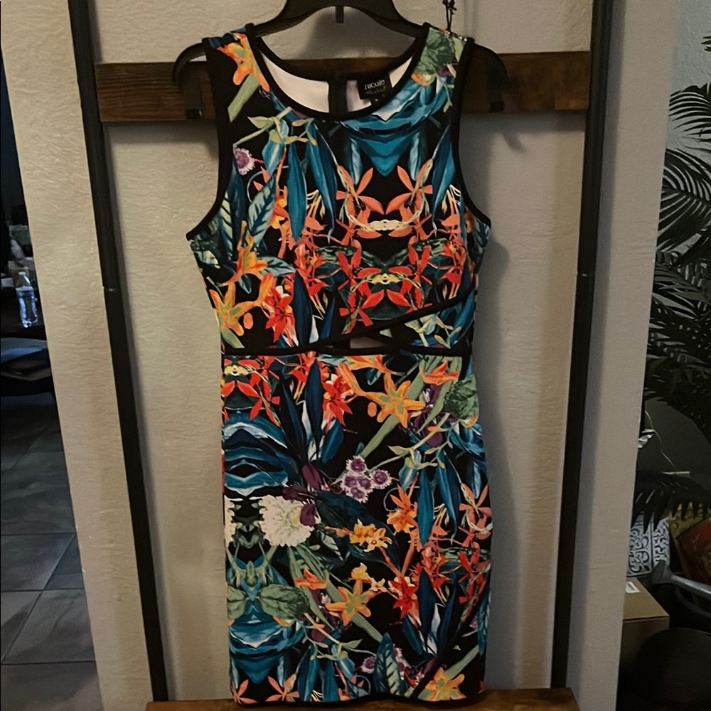 Nicole Miller...Floral Sleeveless Dress peak a boo slot on front